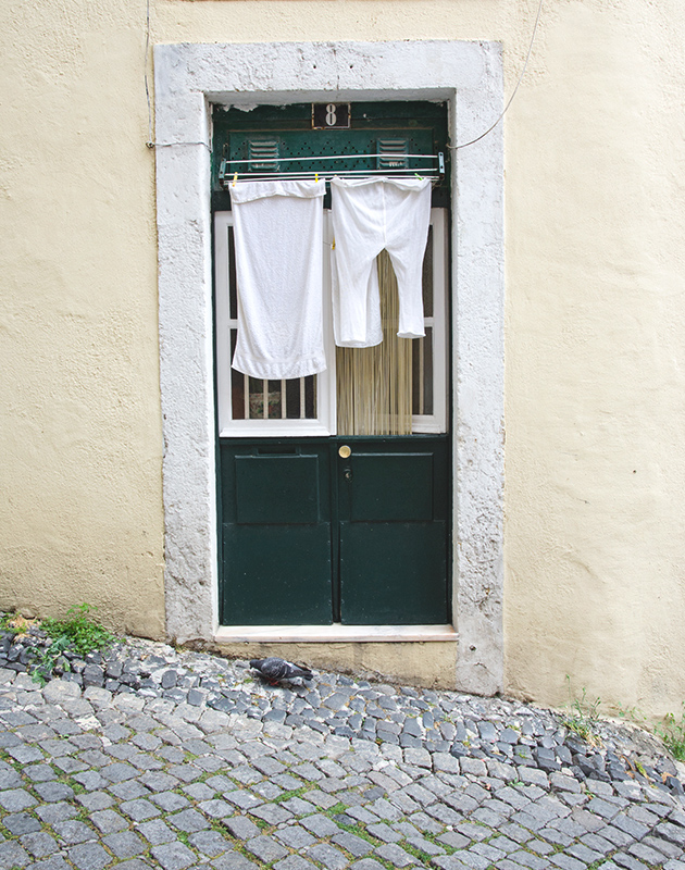 Laundry hanging over doorway