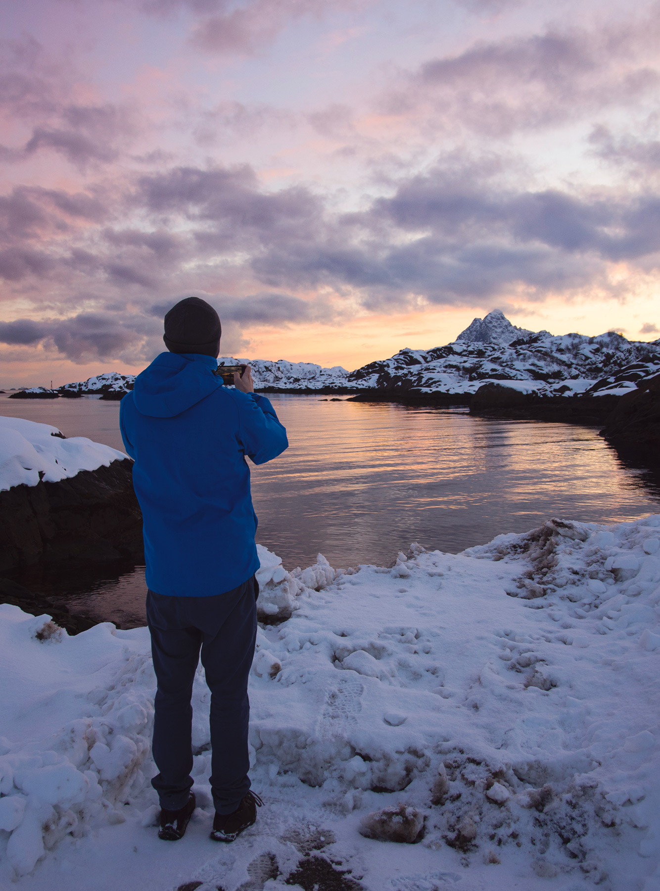 Man photographing the sunset