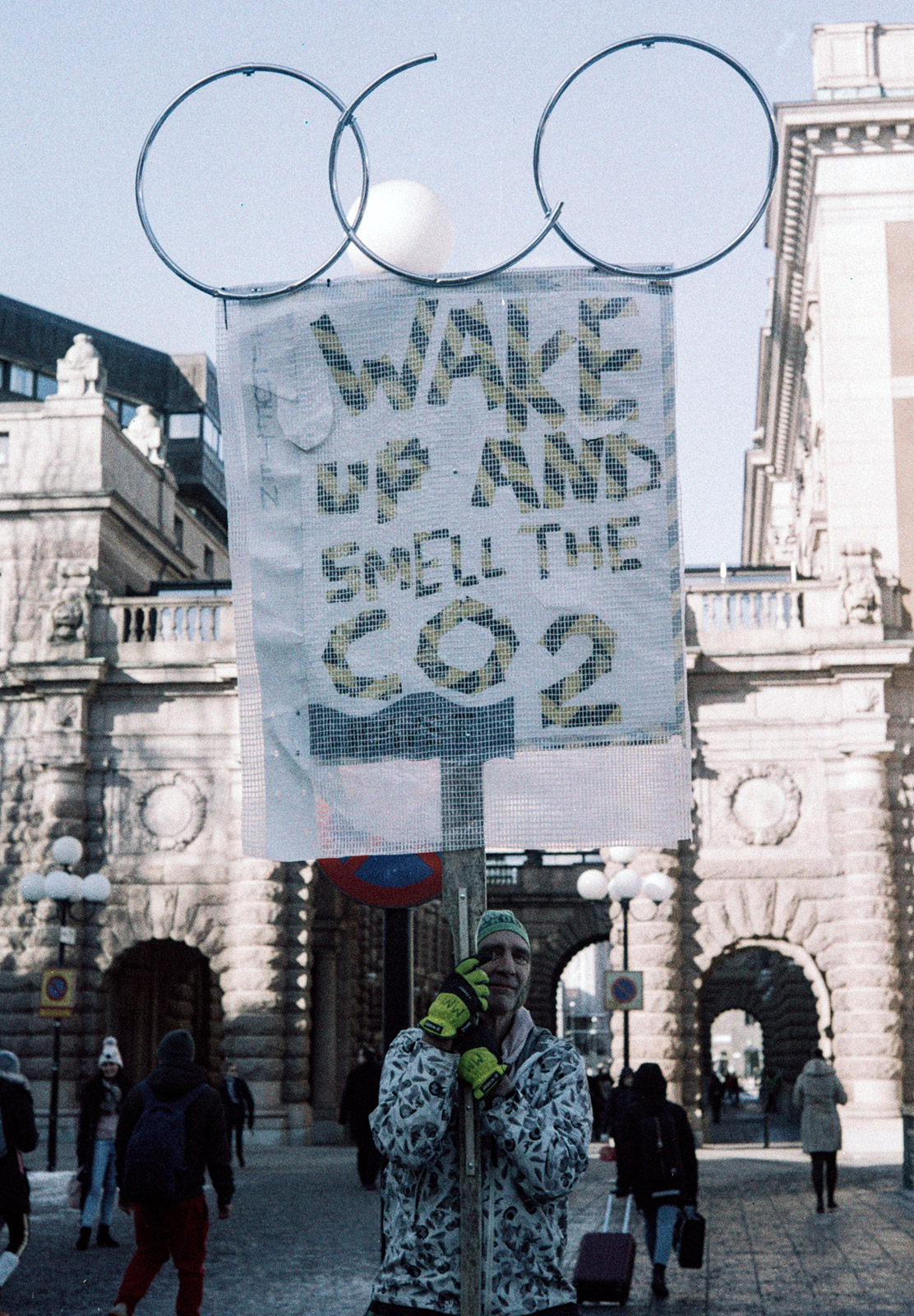 Man holding climate sign