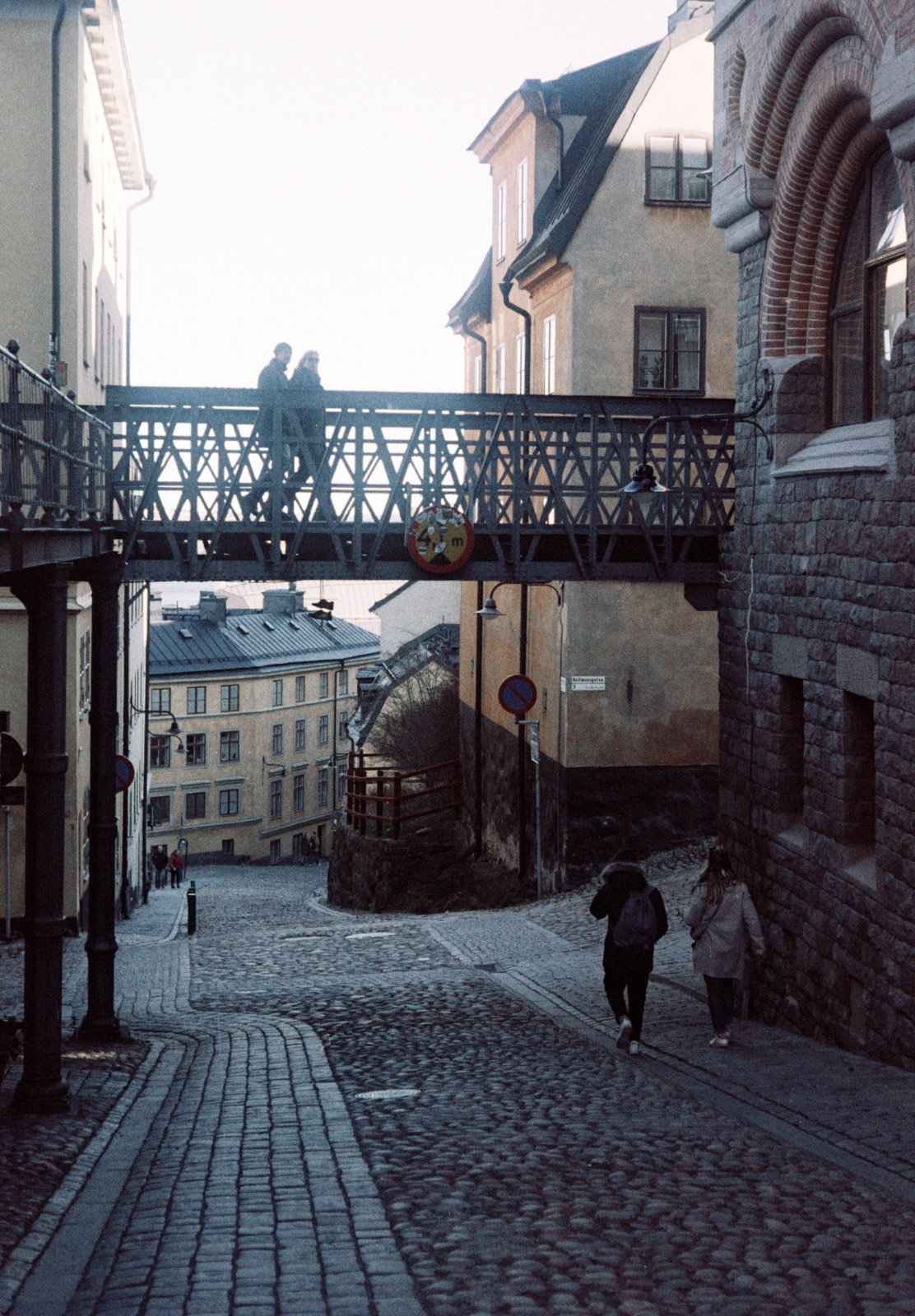 Bridge over cobbled street
