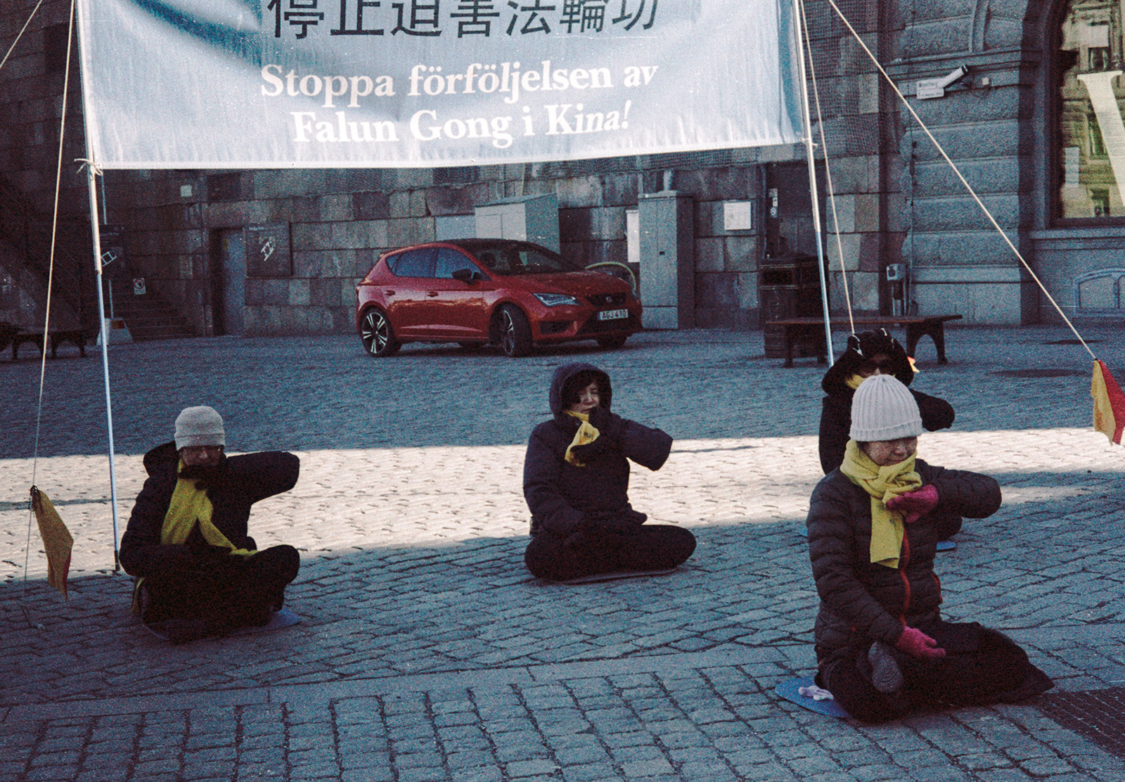 People meditating outdoors