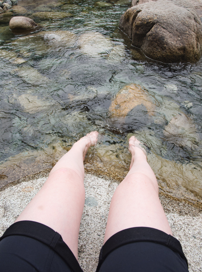Dipping feet in stream