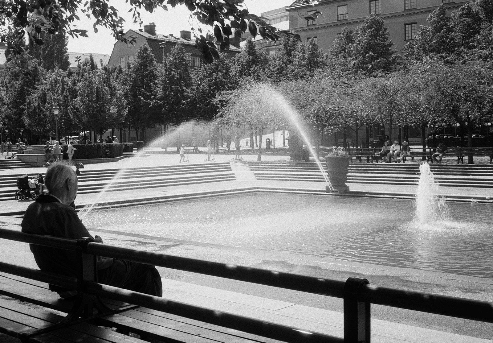 Man watching fountains