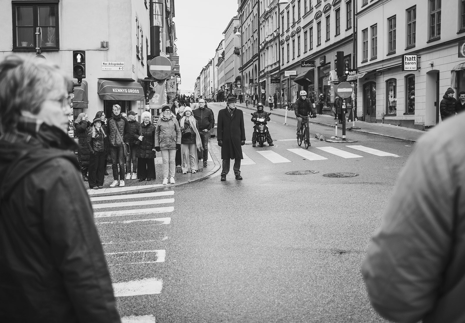 Man standing in the road at crossing