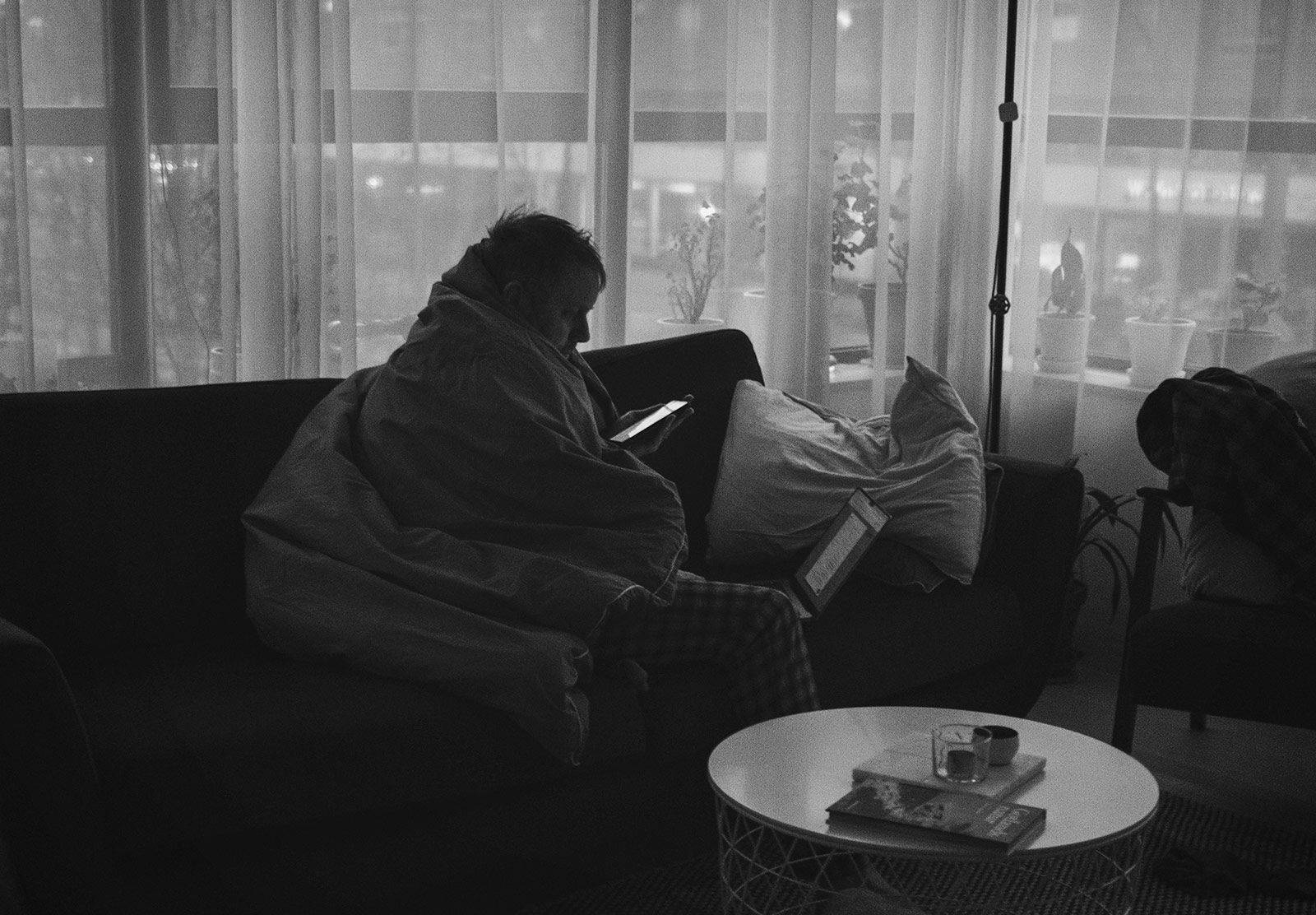 Man wrapped in duvet