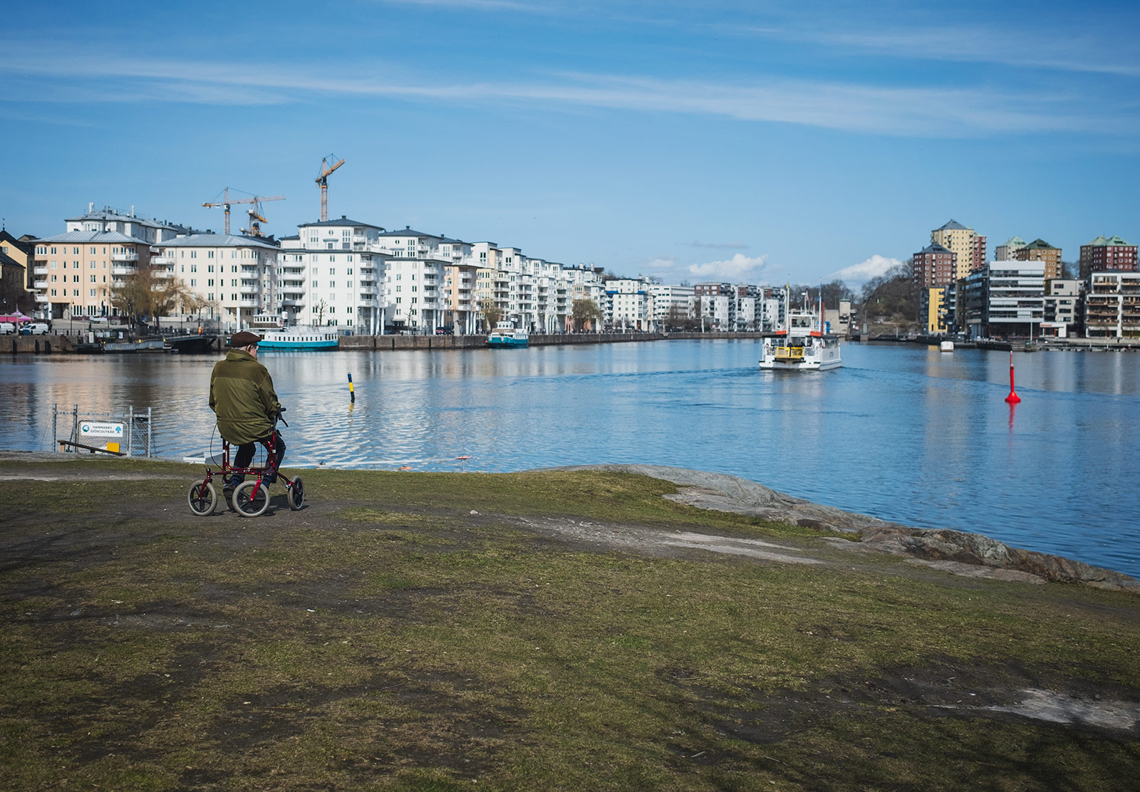 Man sitting by the water