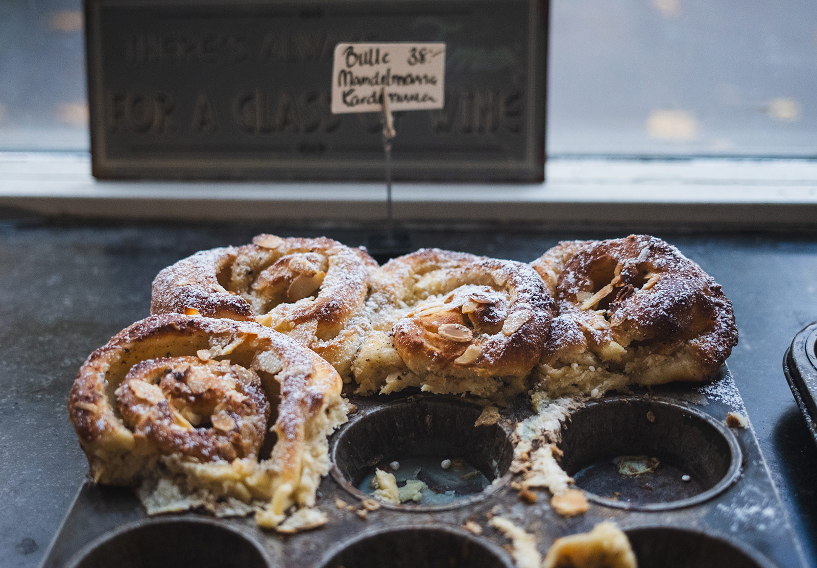 Almond buns in baking tin