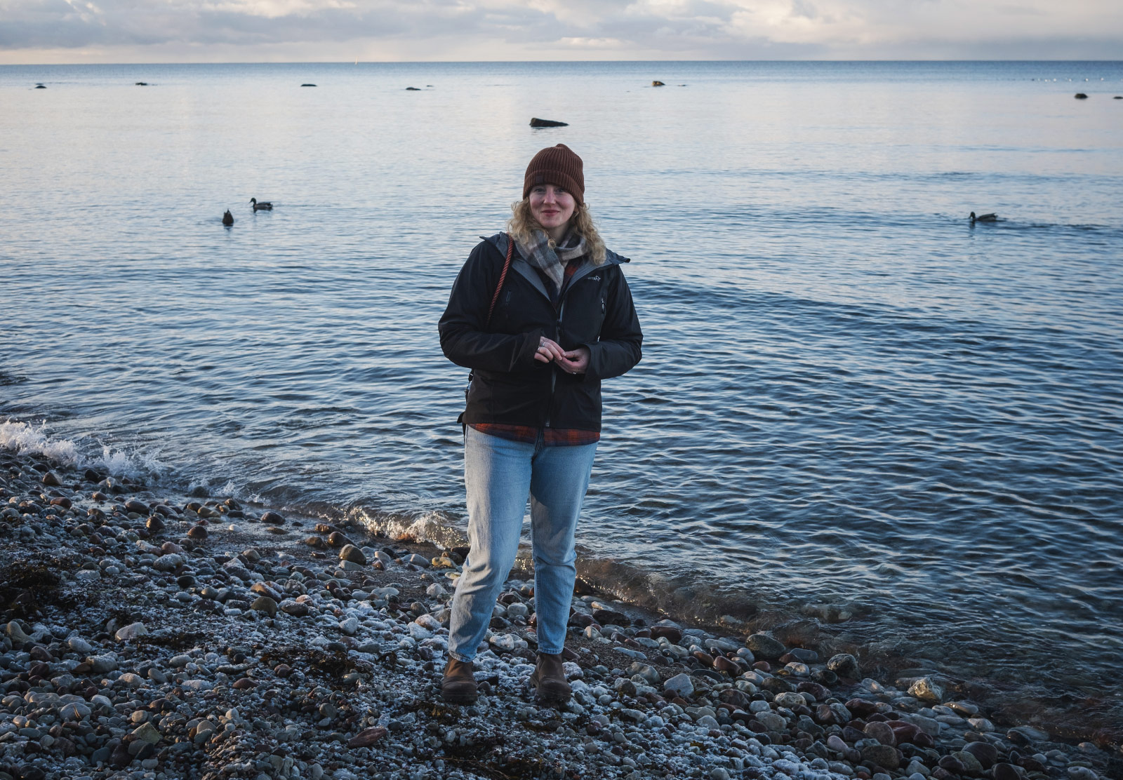 Woman stood on the beach