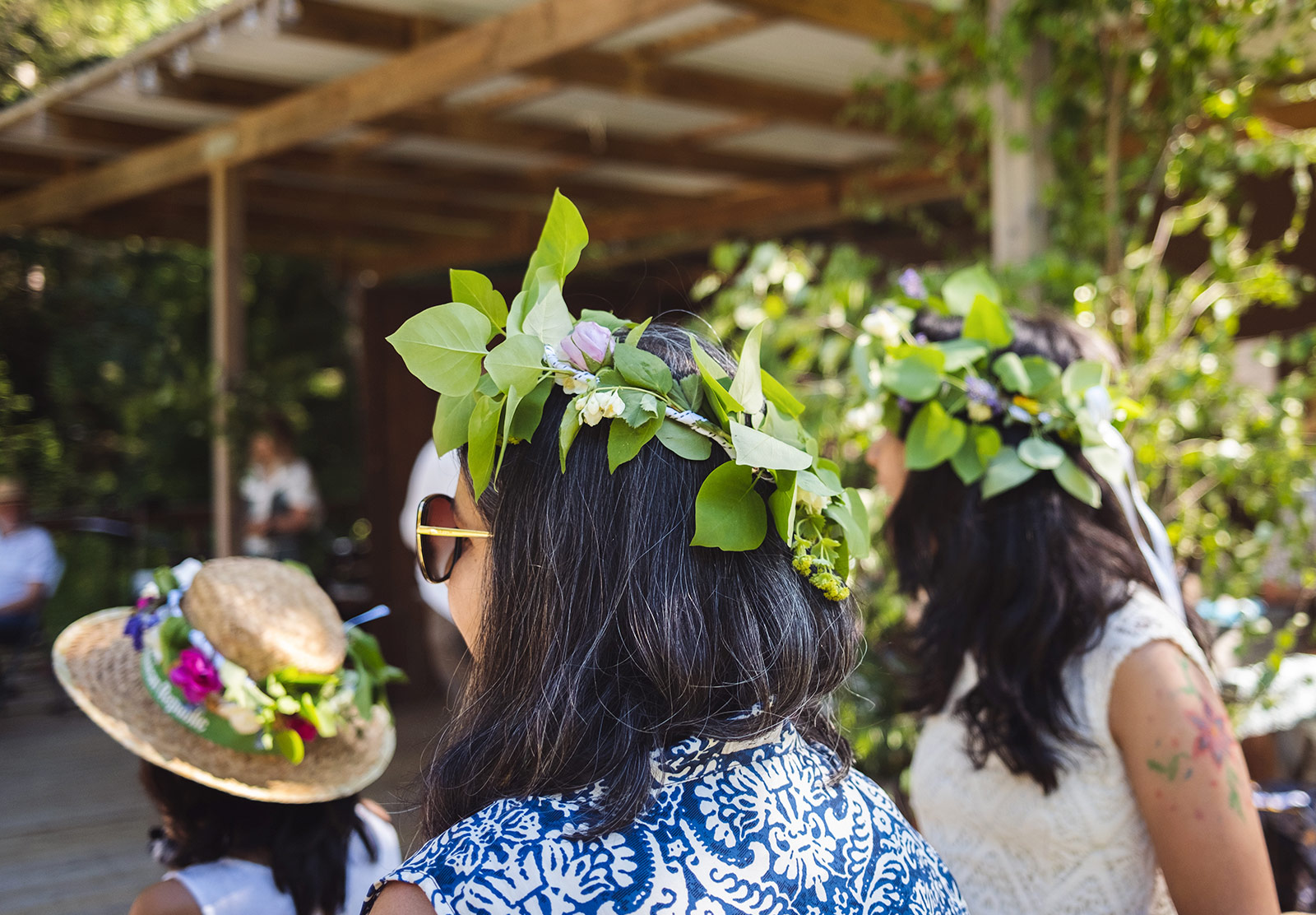 Women wearing flower crowns
