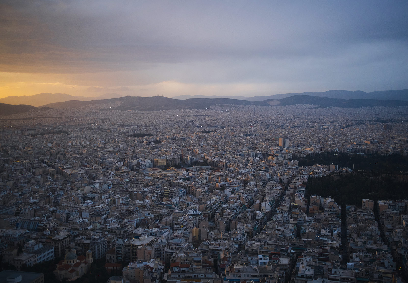 Sunset over sprawling city