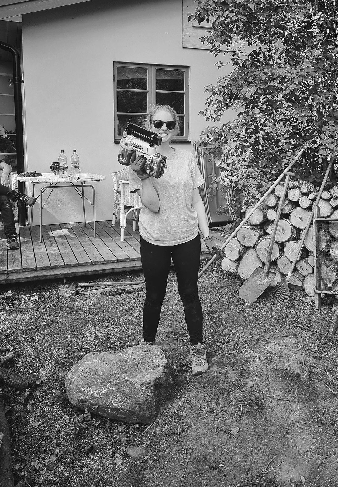 Woman holding nail gun