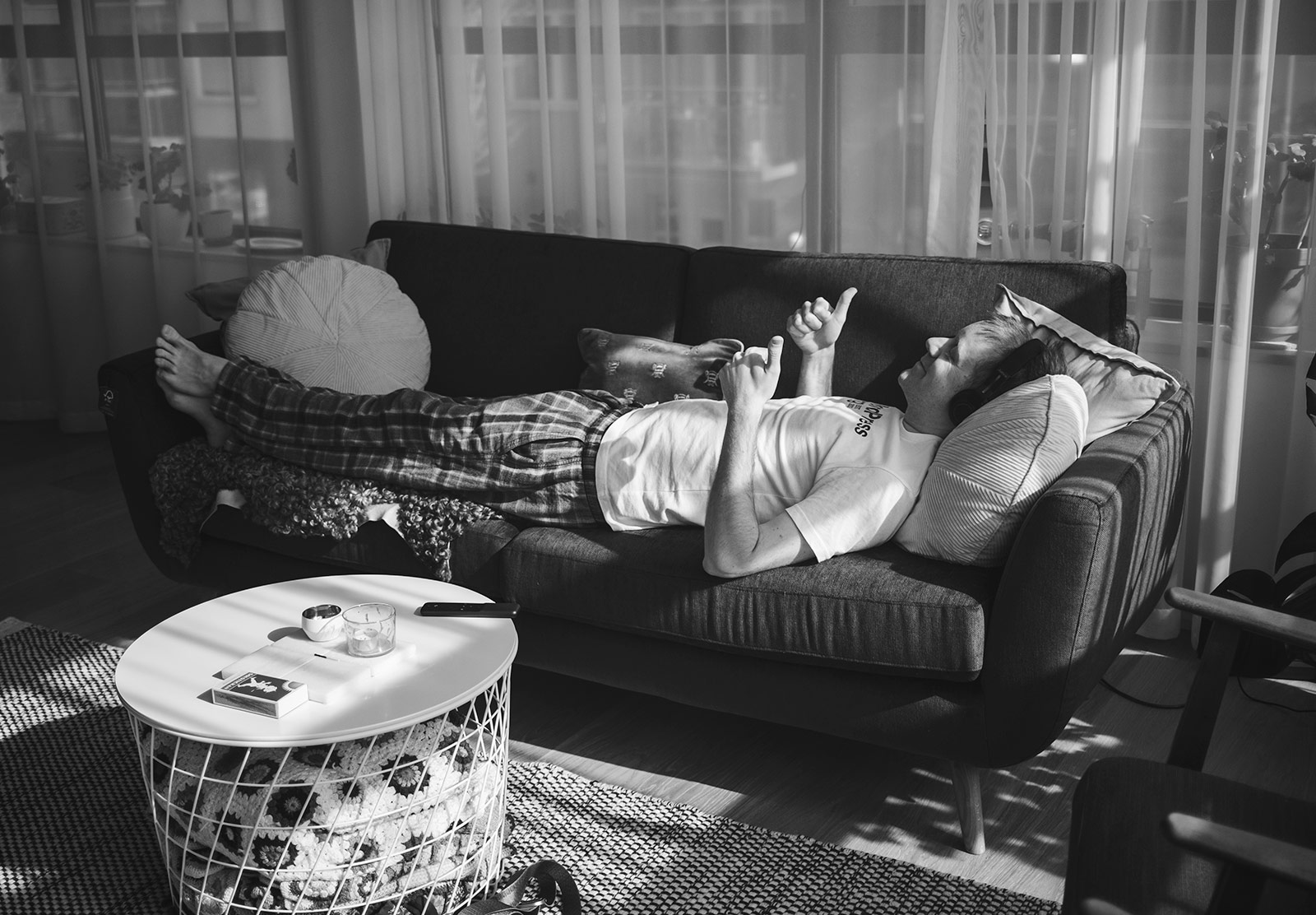 Man laying on sofa