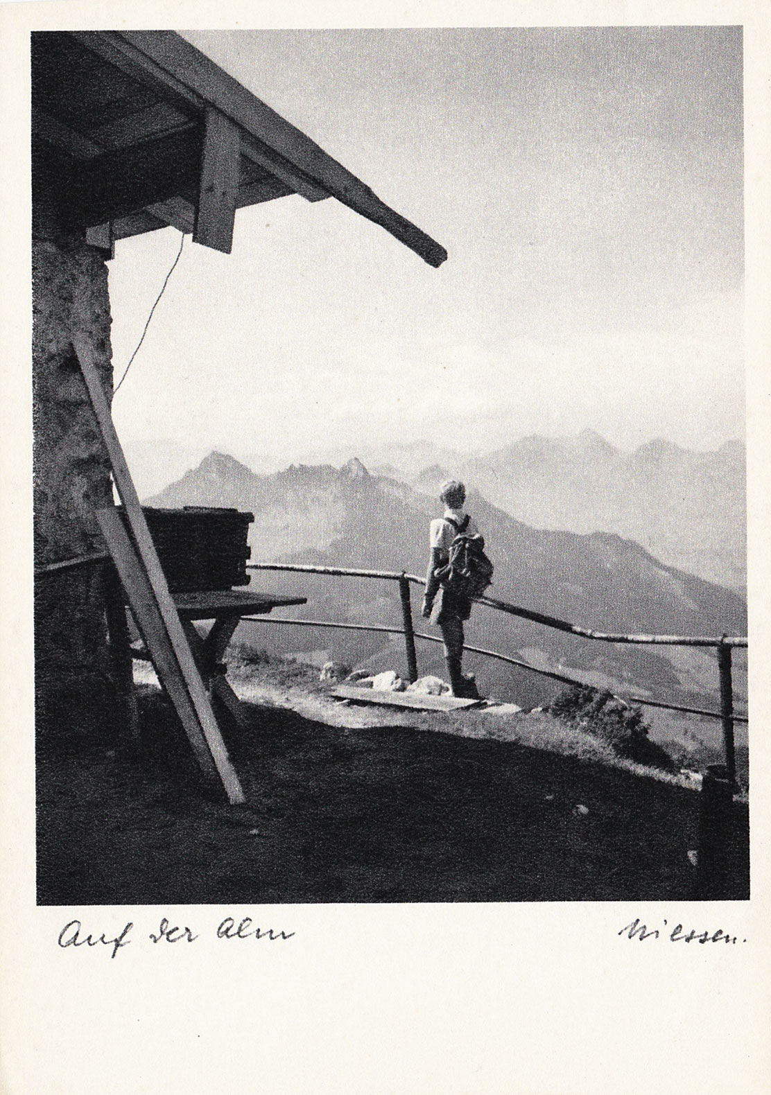Boy overlooking mountains