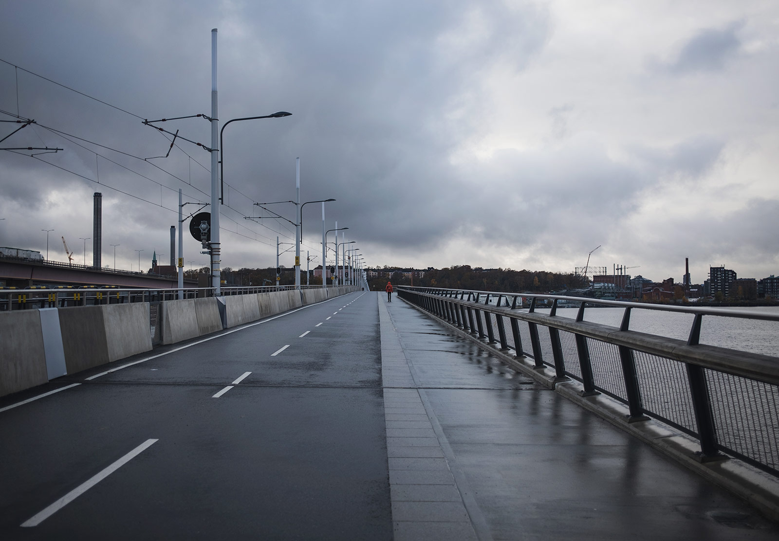 Concrete footbridge and grey skies