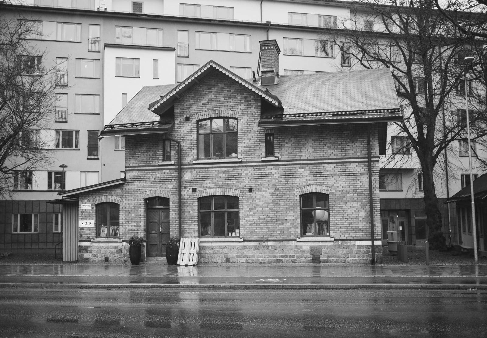 New buildings behind old brick building