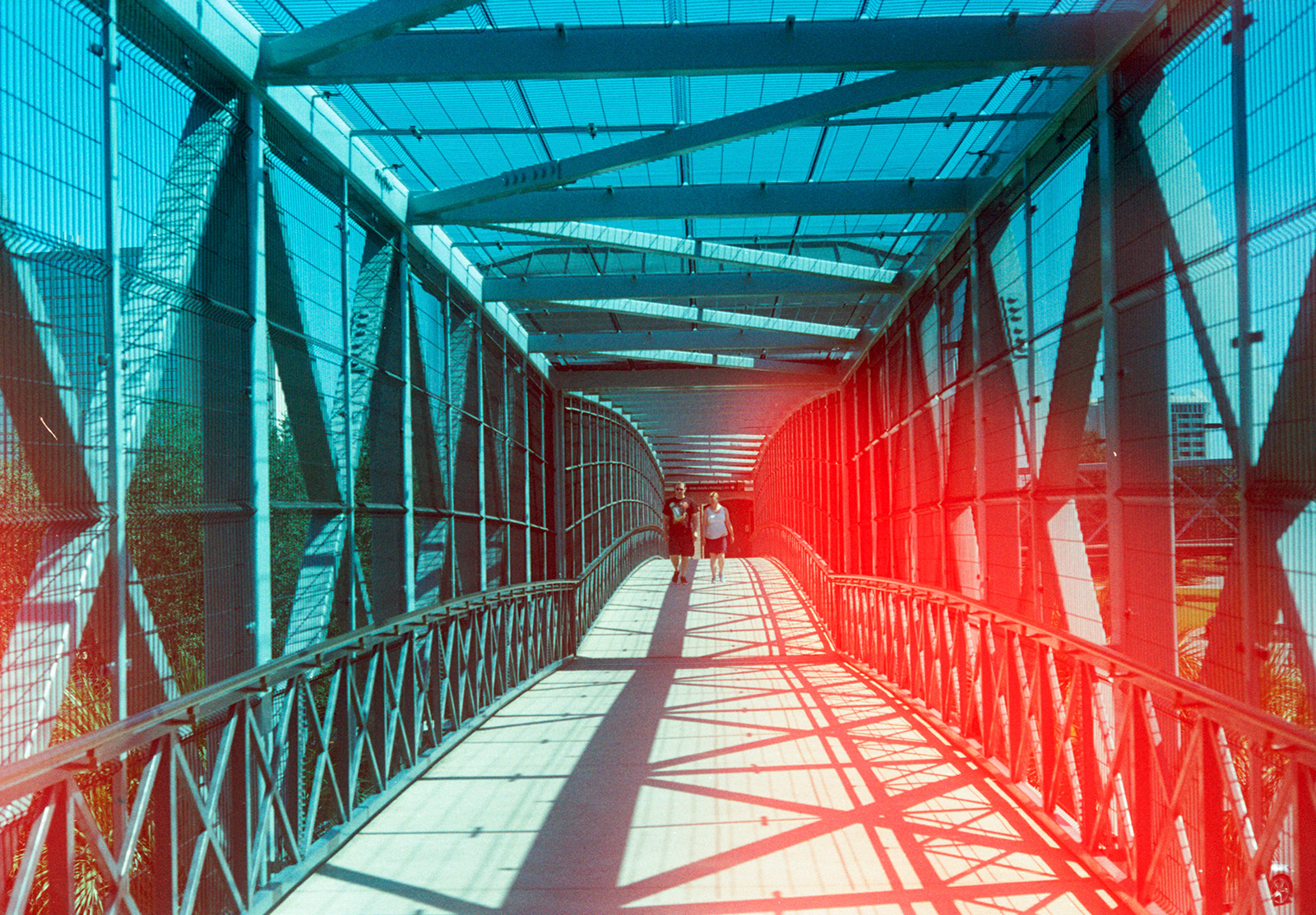 People walking on bridge