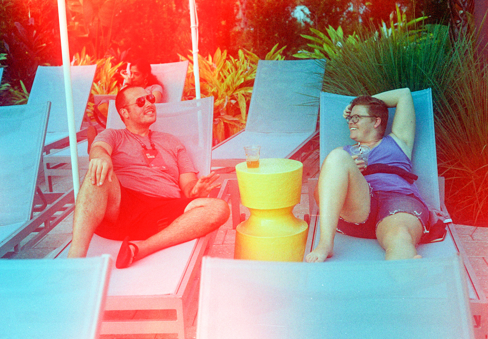 Couple on sun loungers