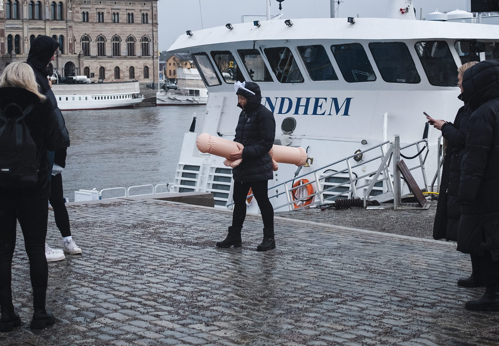 Woman wearing inflatable penis