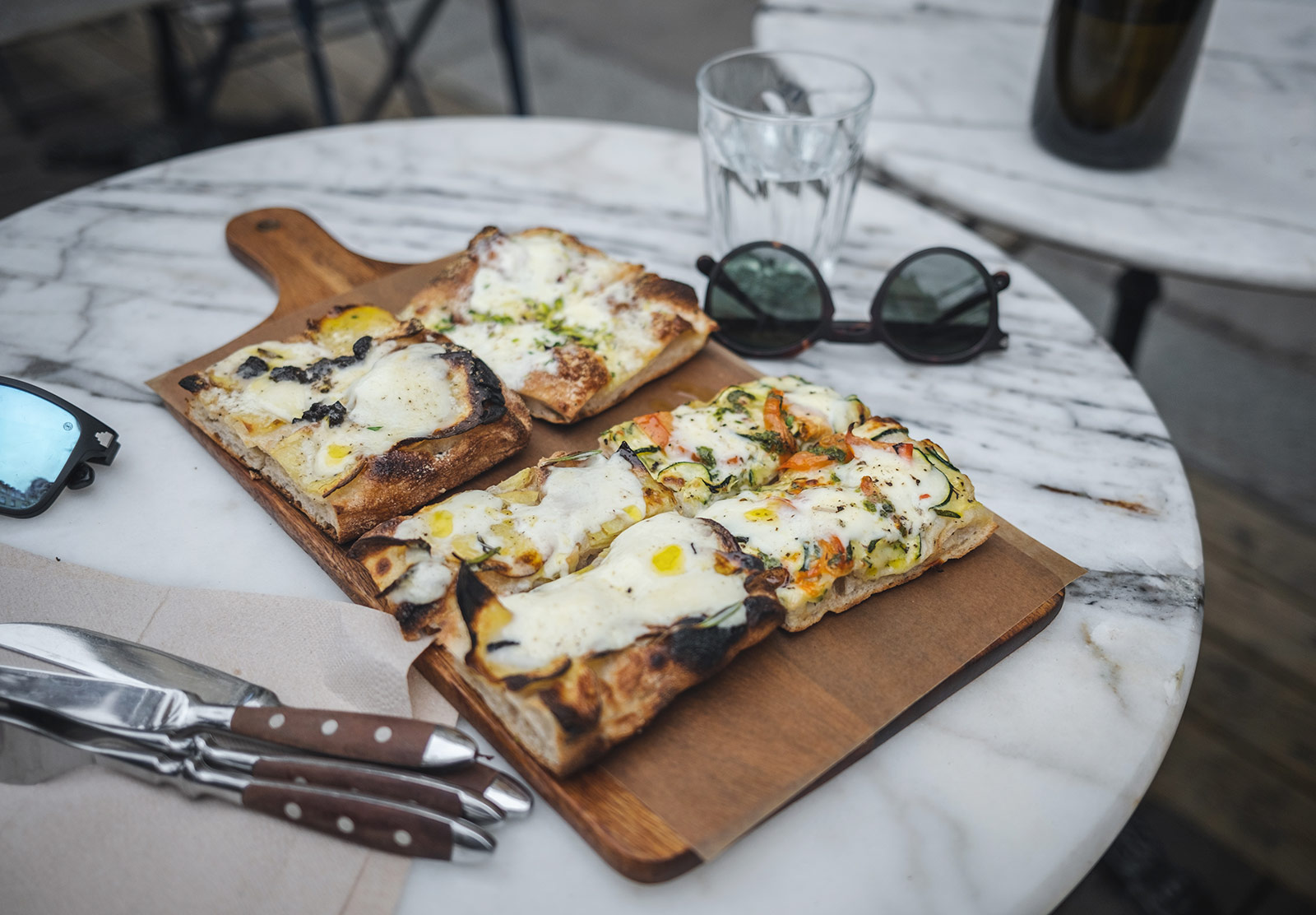 Pizza on wooden platter