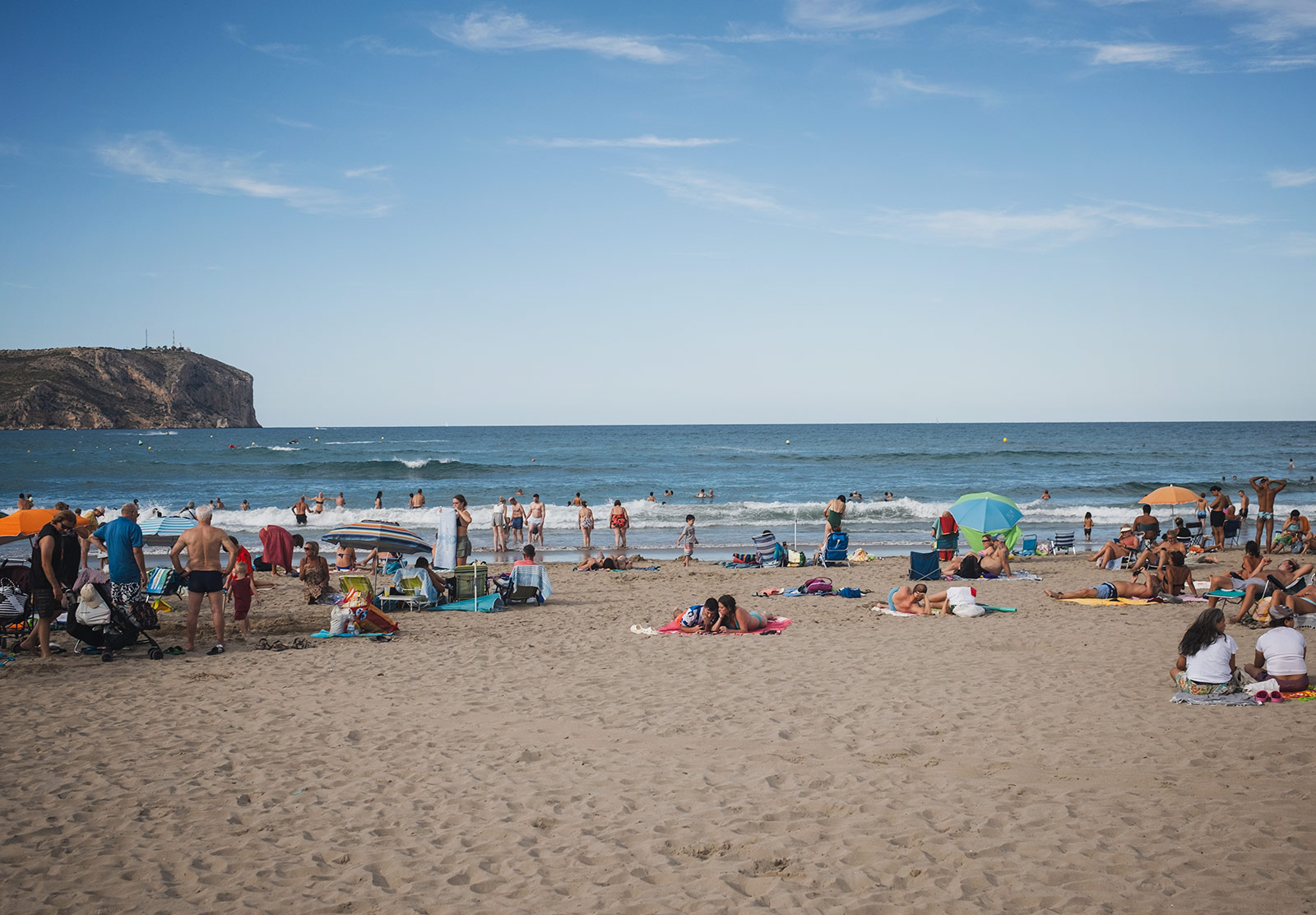 People on the beach and in the sea