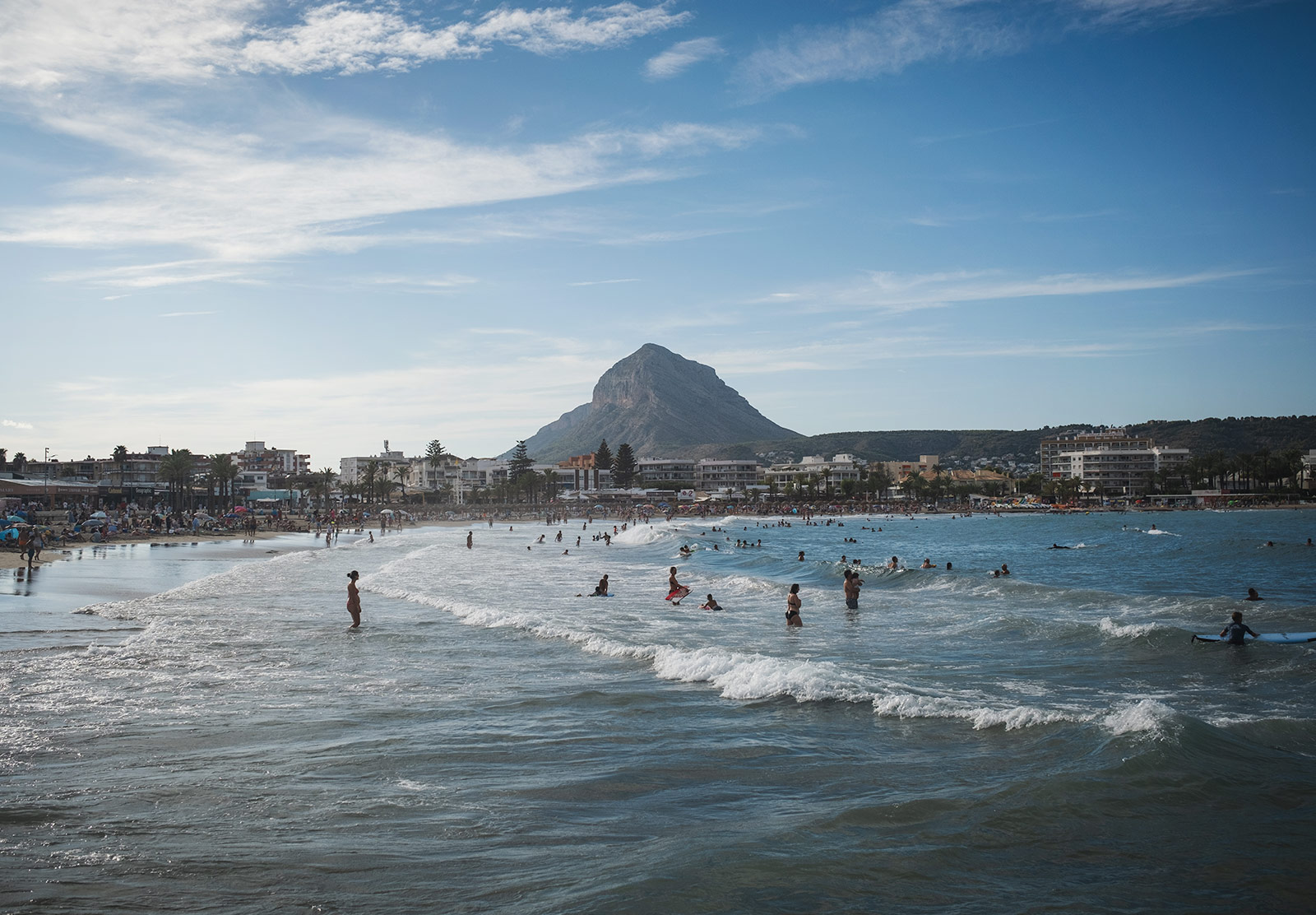 View of mountain at the end of a beach