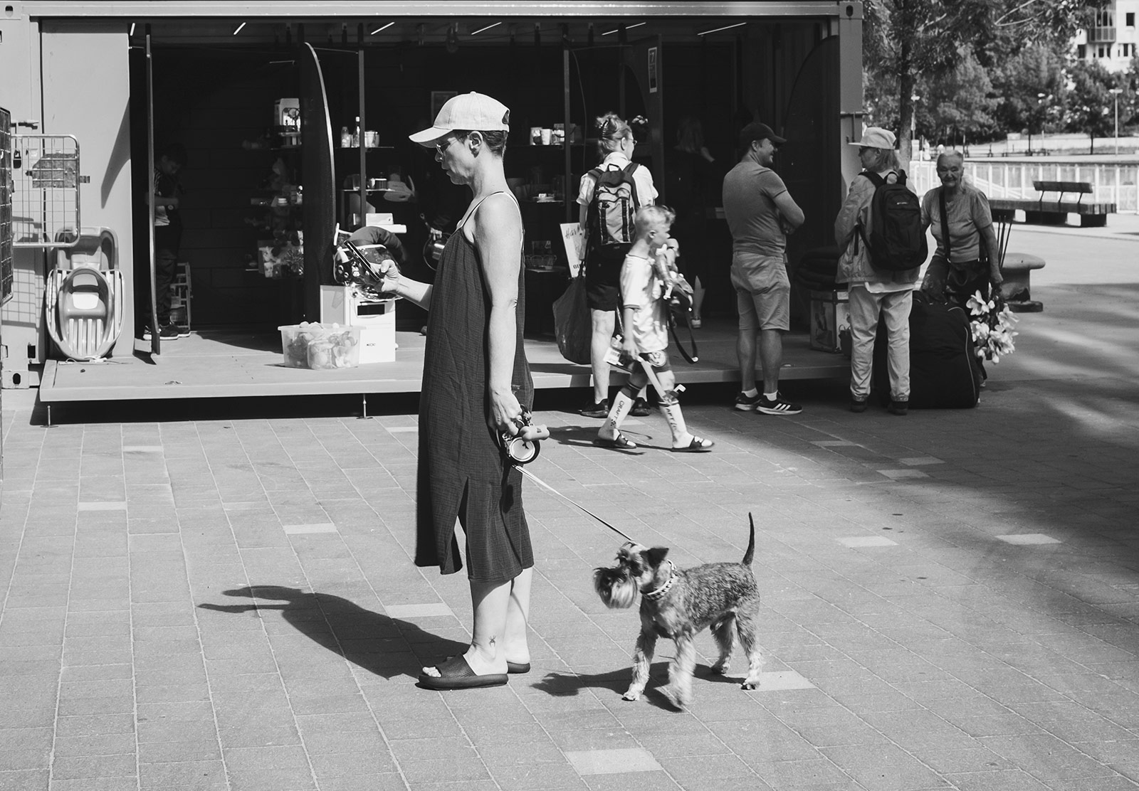 Woman standing with dog
