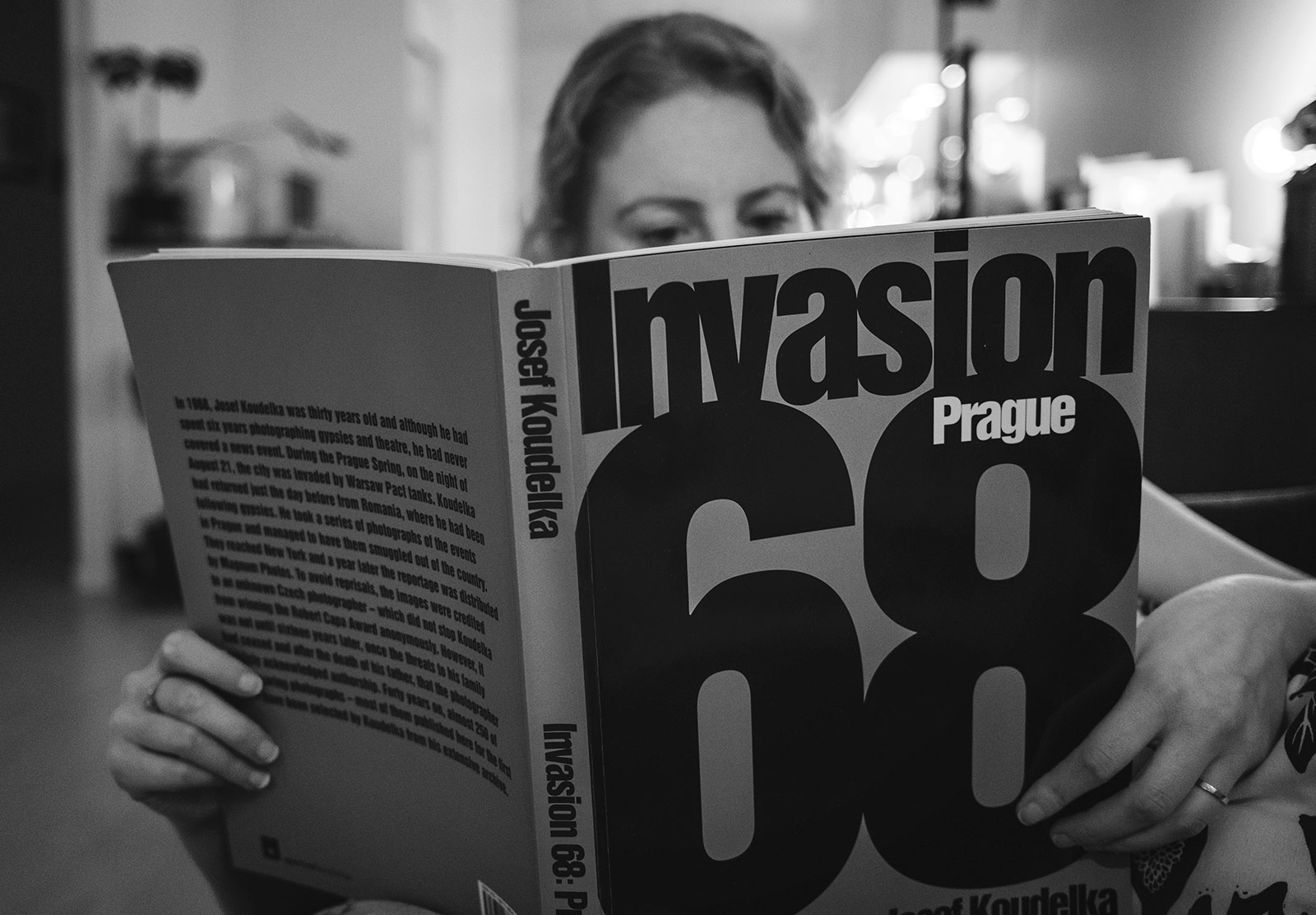 Woman reading big book