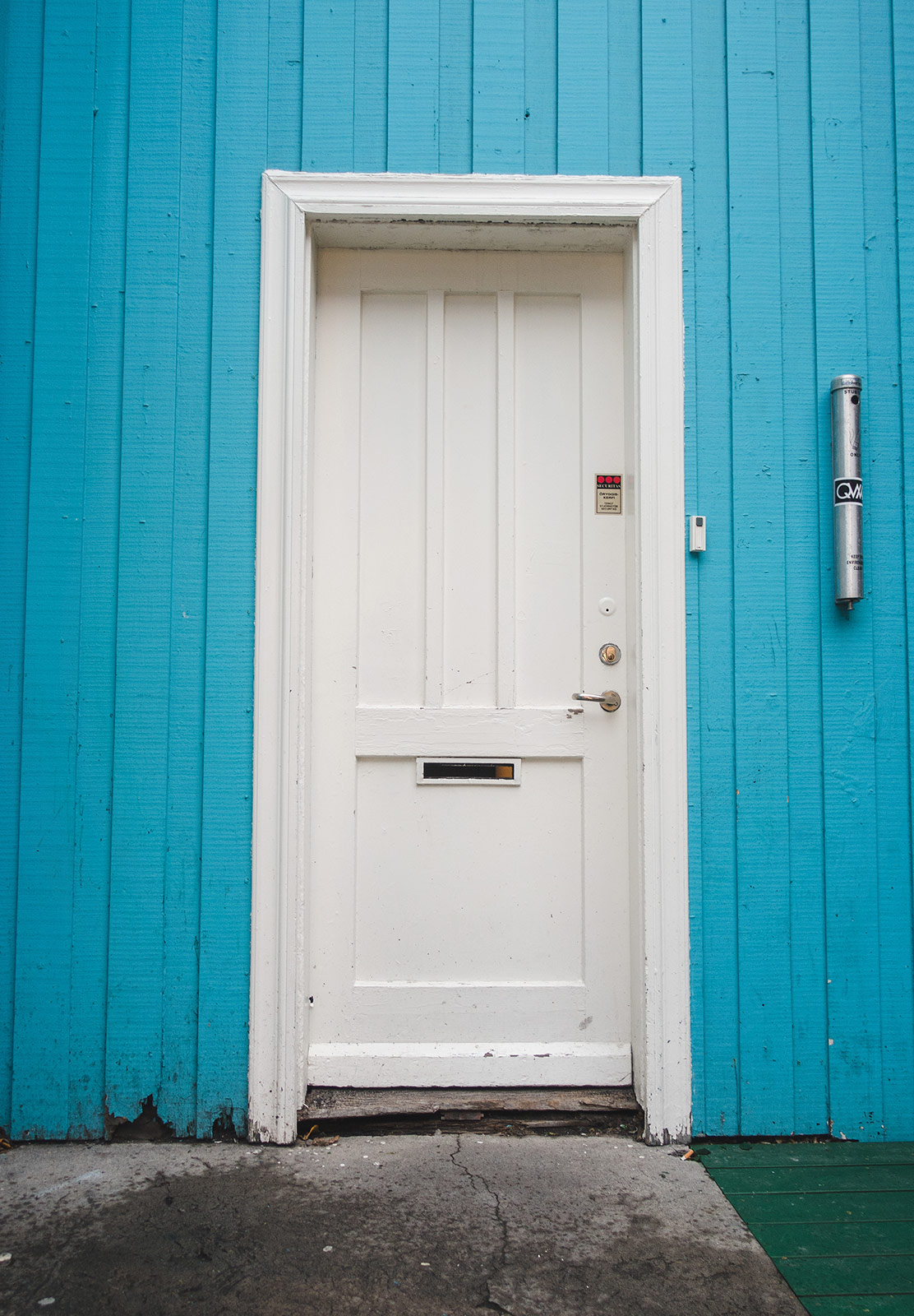 Blue wood and white door