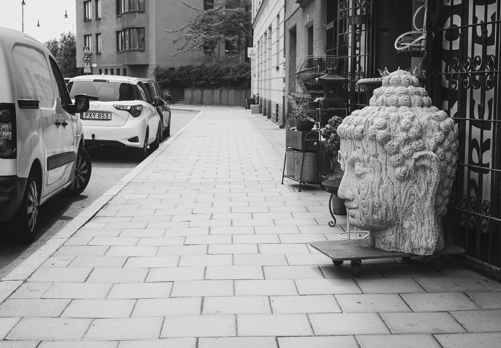 Large stone head on trolley