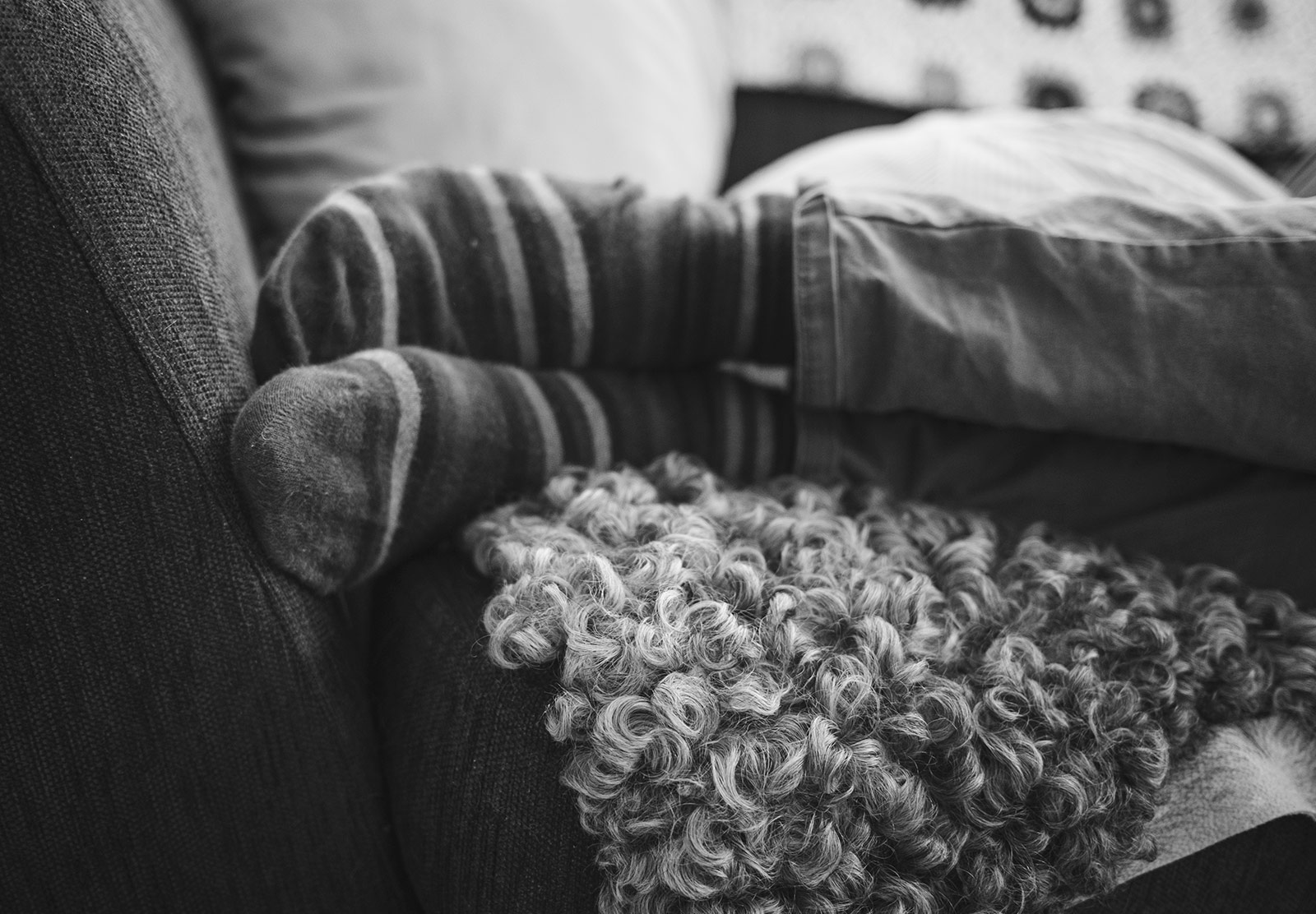 Foot on sofa