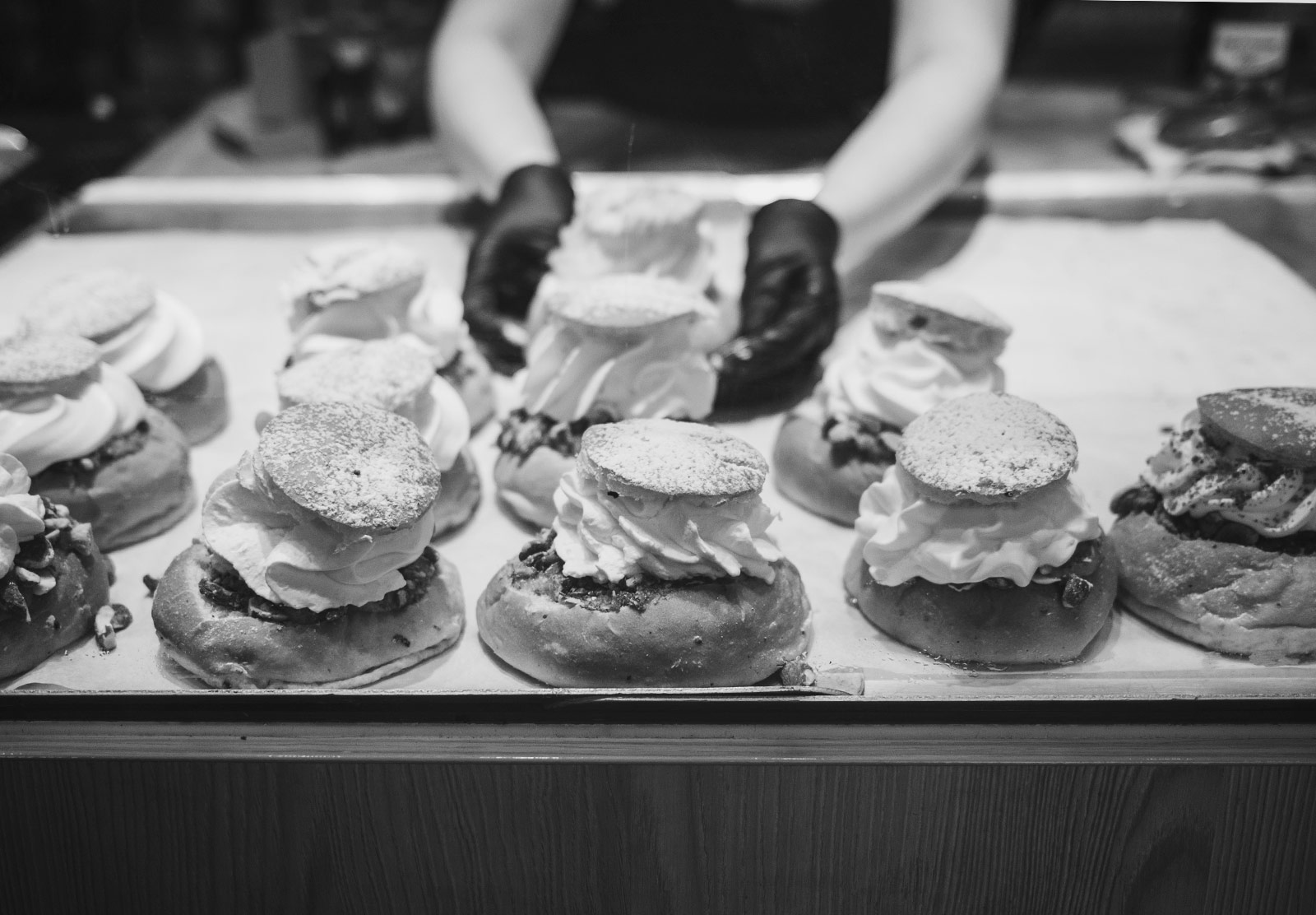 Row of cream cakes