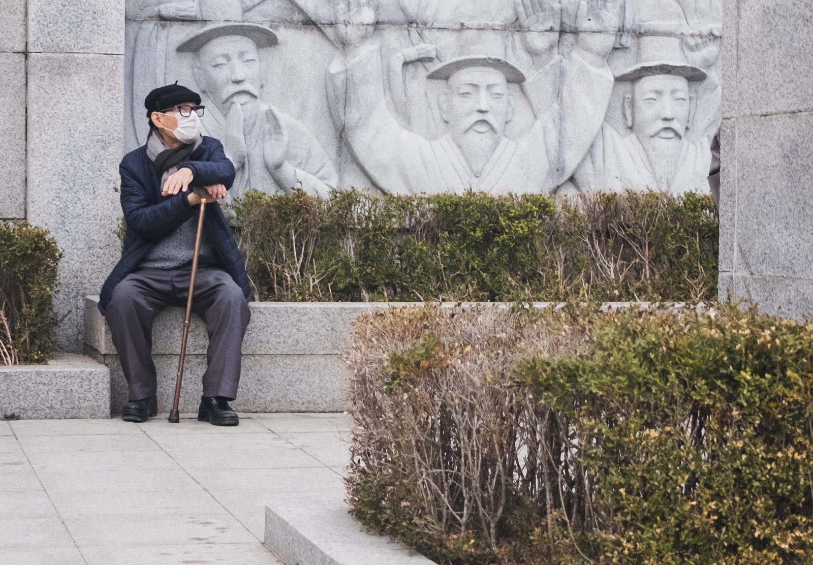 Man sitting on a wall
