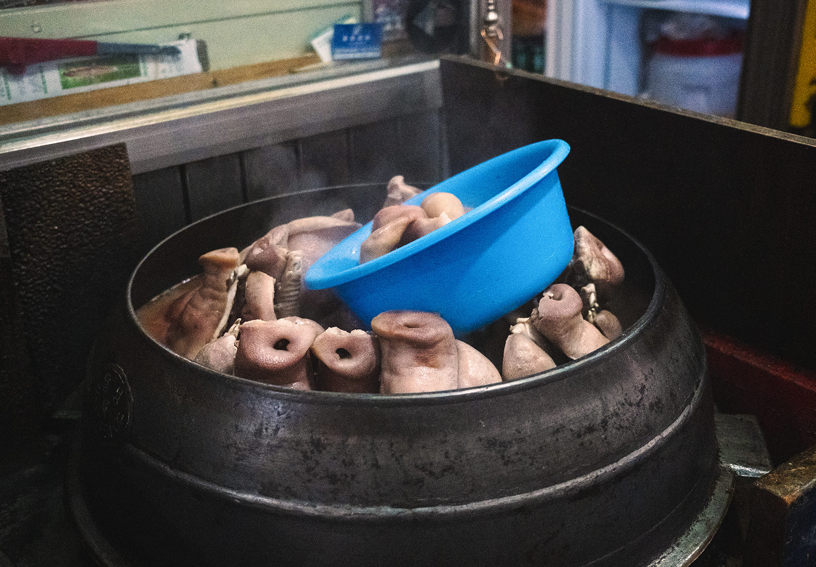 Large bowl of cooked pig snouts
