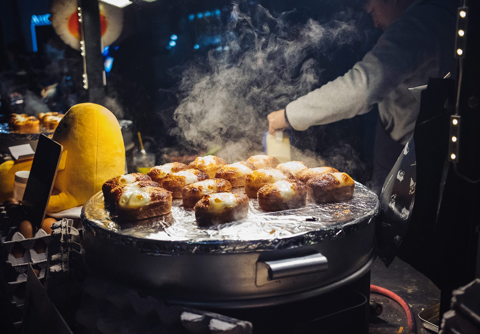 Cheesy egg bread cooking outdoors