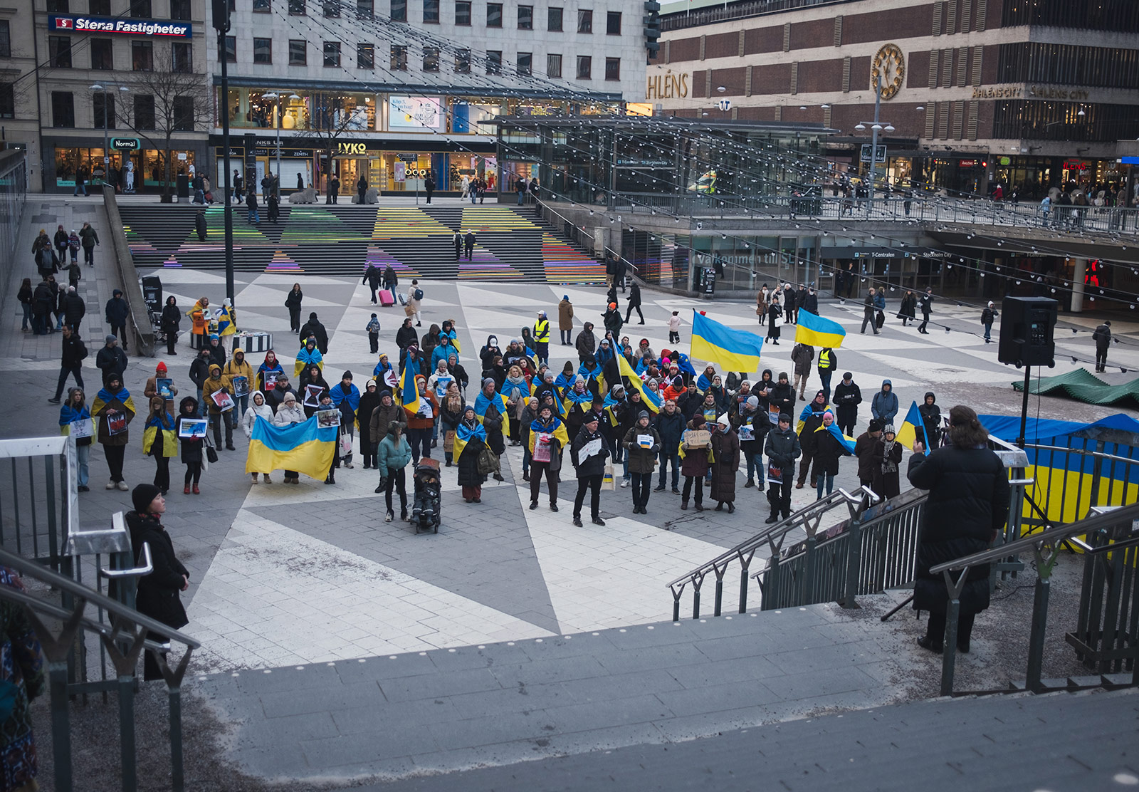 People gathered with Ukrainian flags