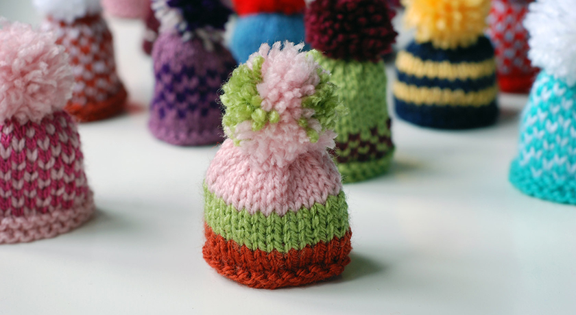 Pink, green and orange stripy hat