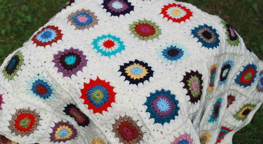 Blanket draped on stool