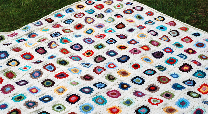Blanket laid out on grass