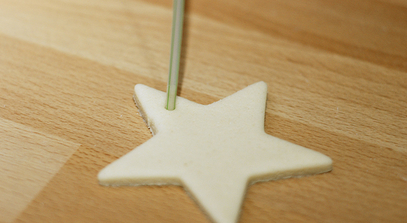 Making a hole in dough with a straw