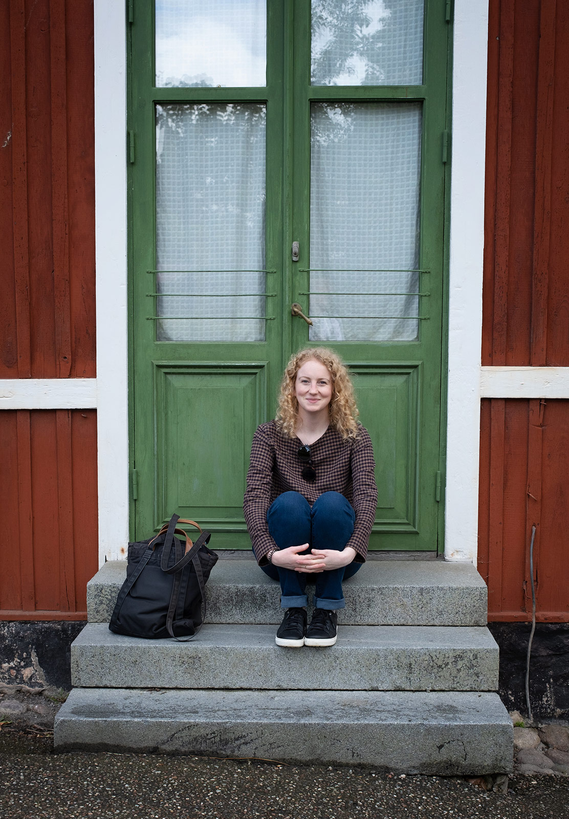 Woman sat on step