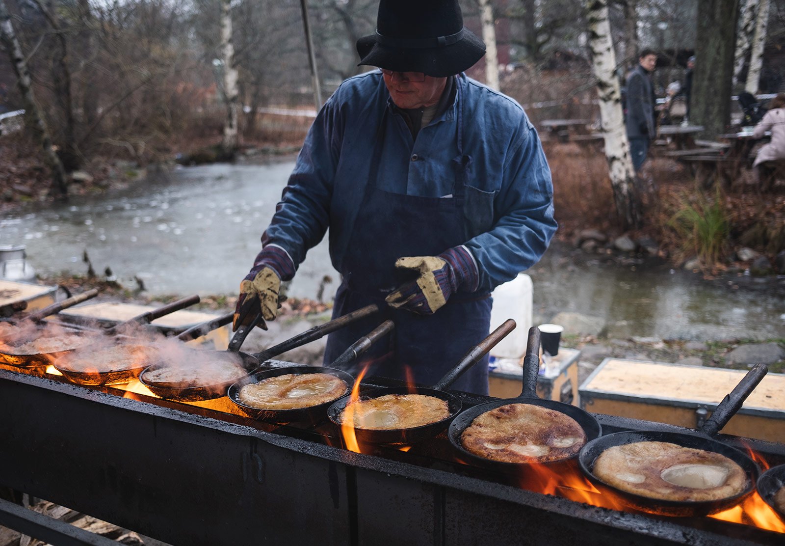Man cooking with pans