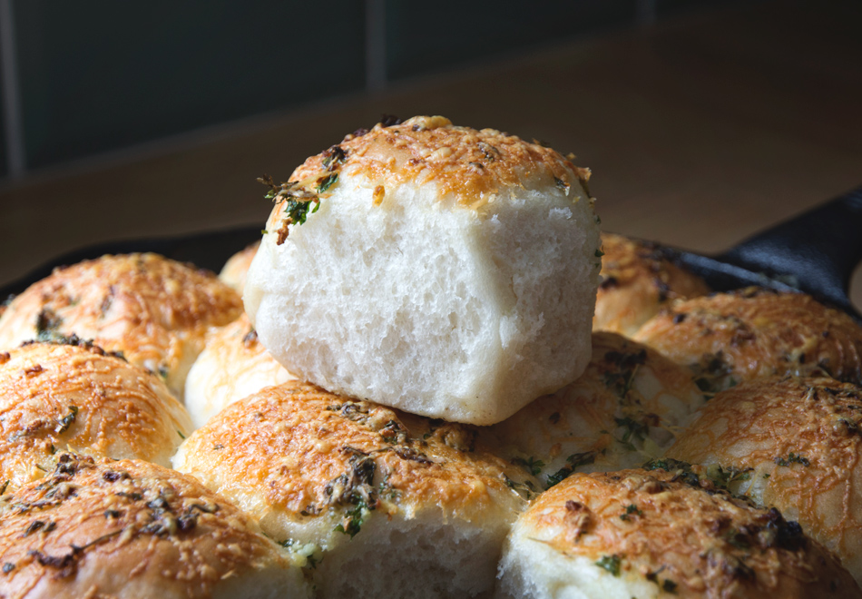 Fluffy white rolls in pan