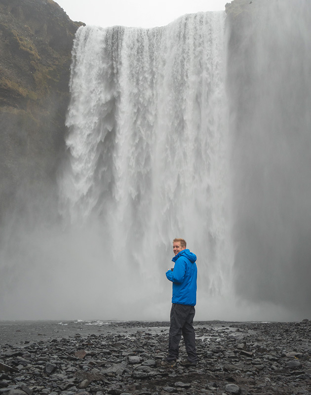 Scott in front of waterfall