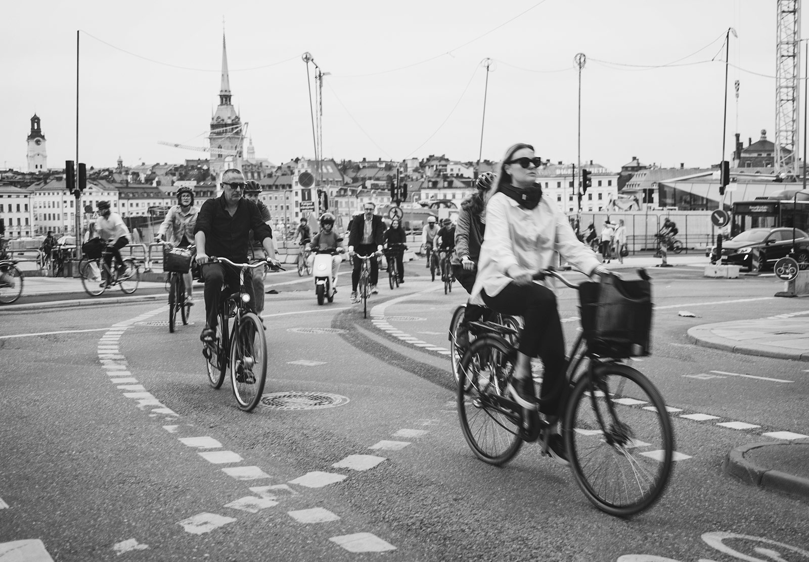 Stream of cyclists in a cycle lane
