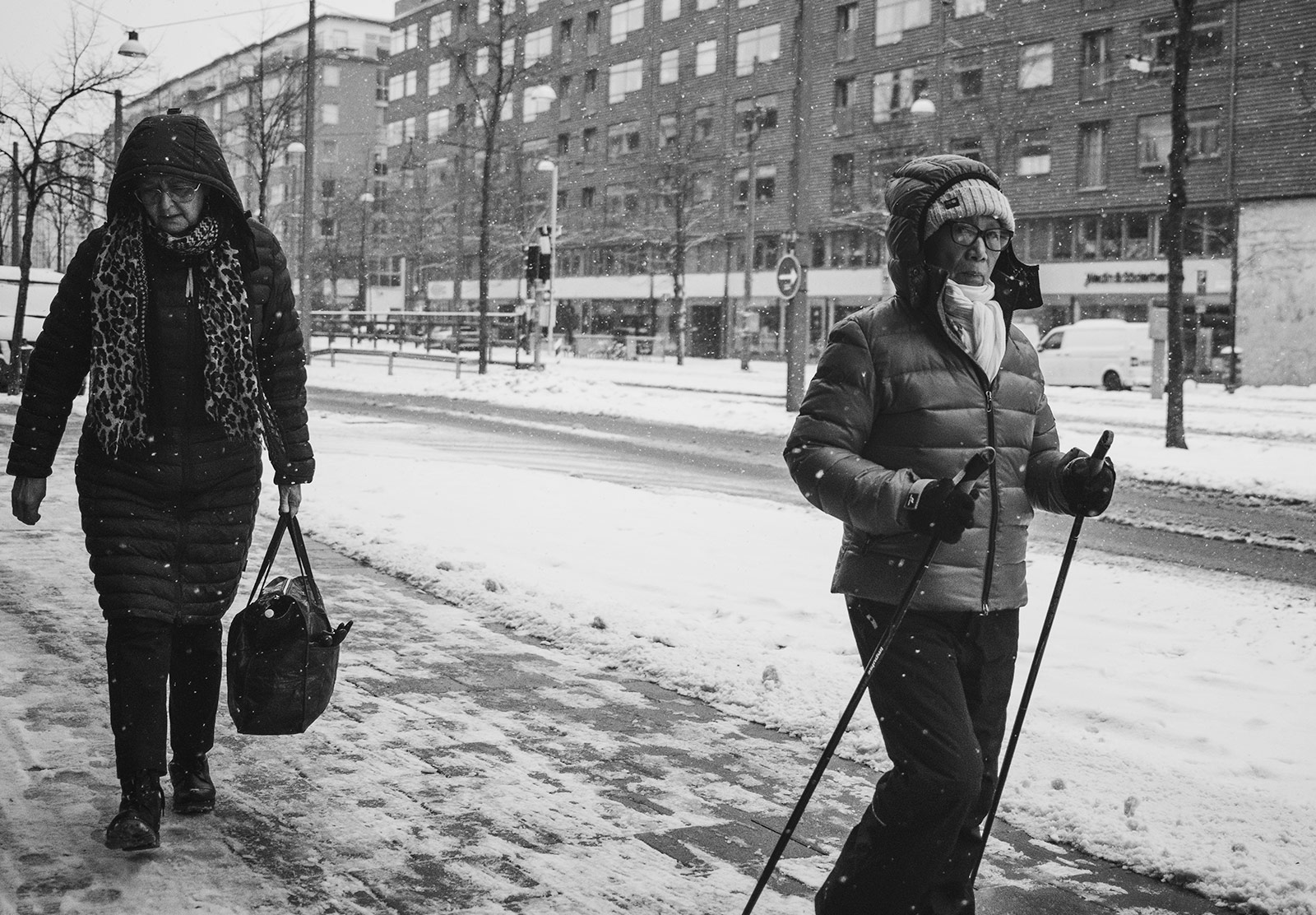 City woman with walking poles
