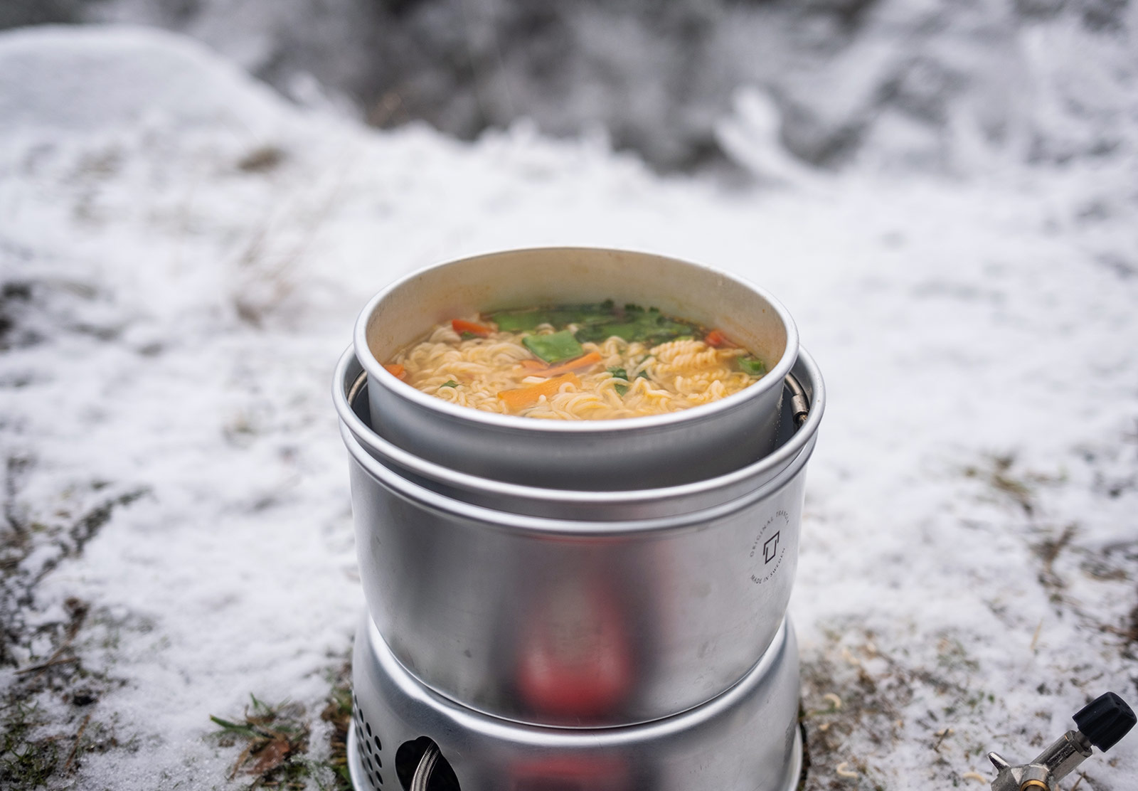 Noodles cooking in pan