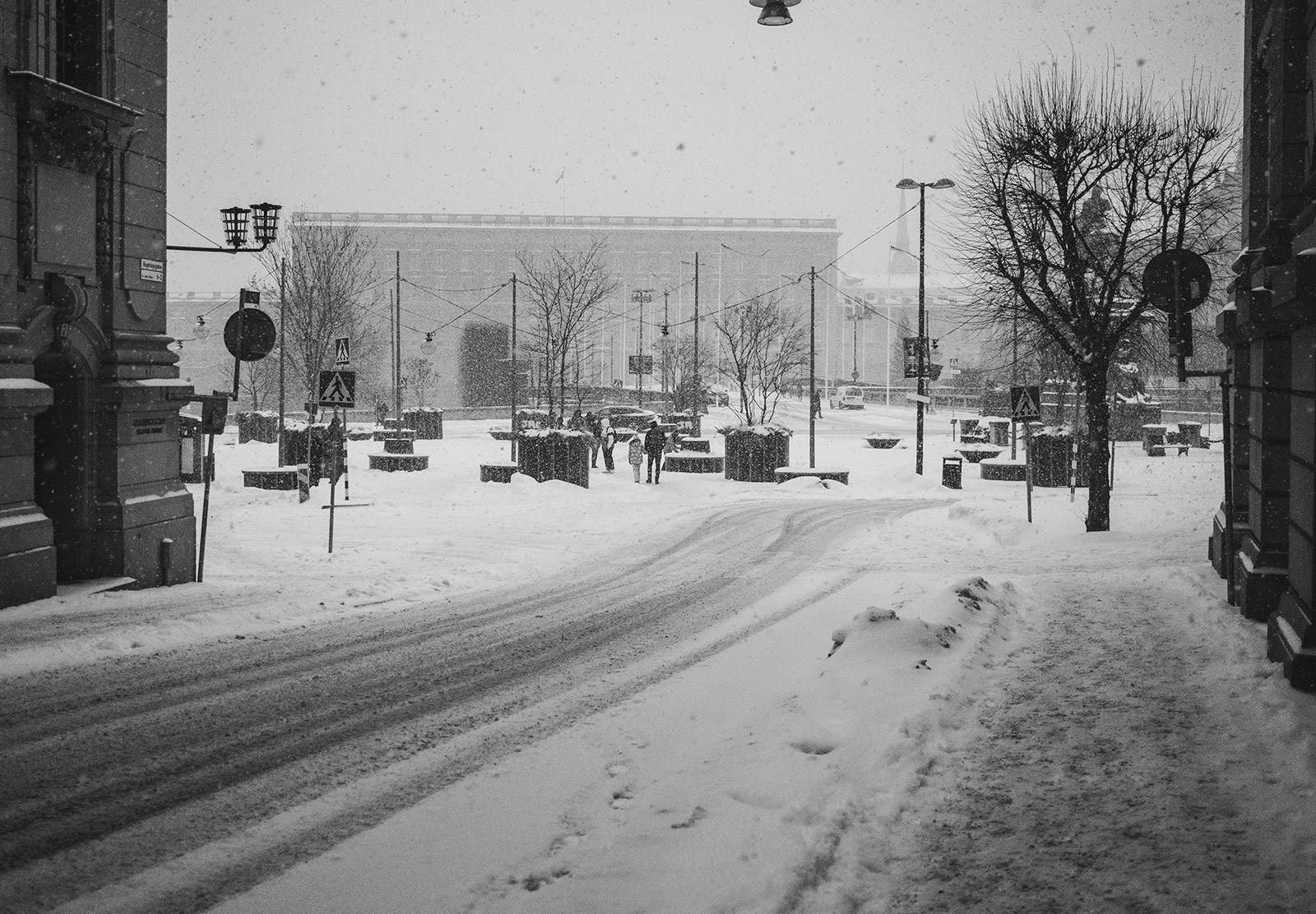View down snow covered street