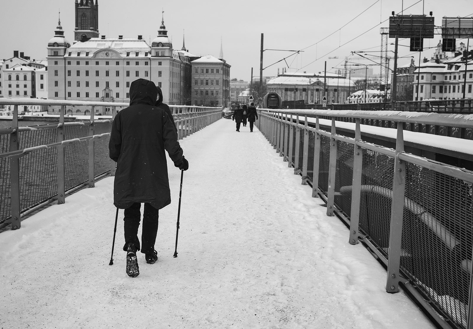 Woman walking with sticks