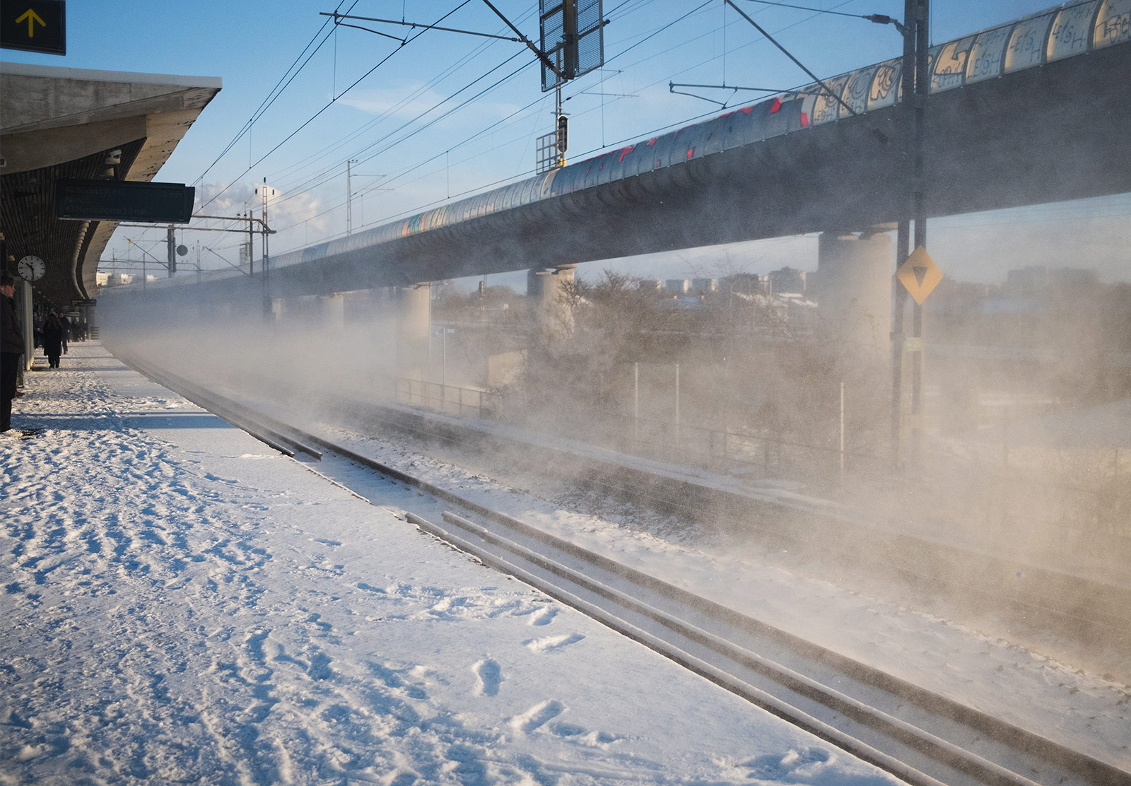 Snow in the air at train station