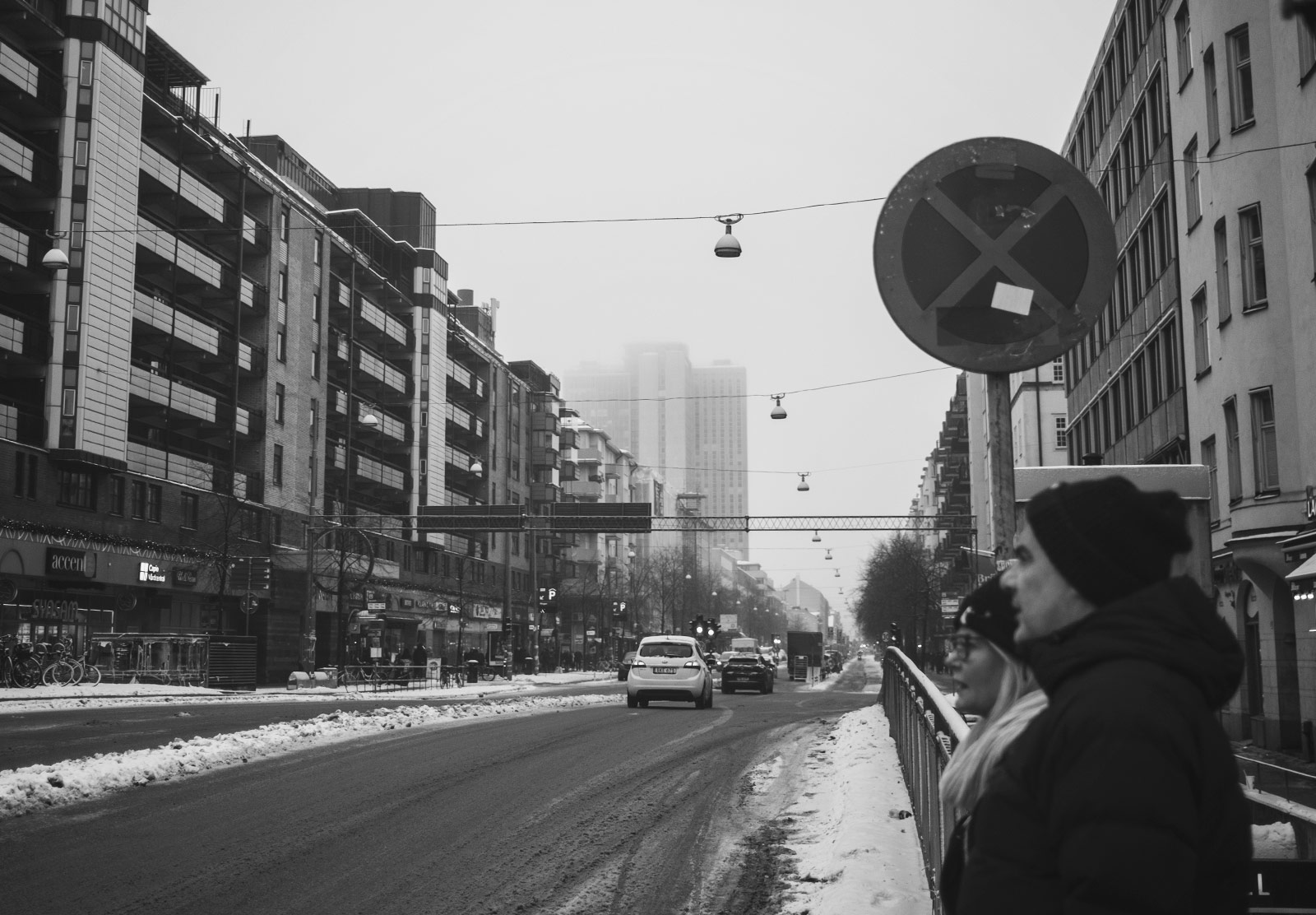 Fog hanging over tall building